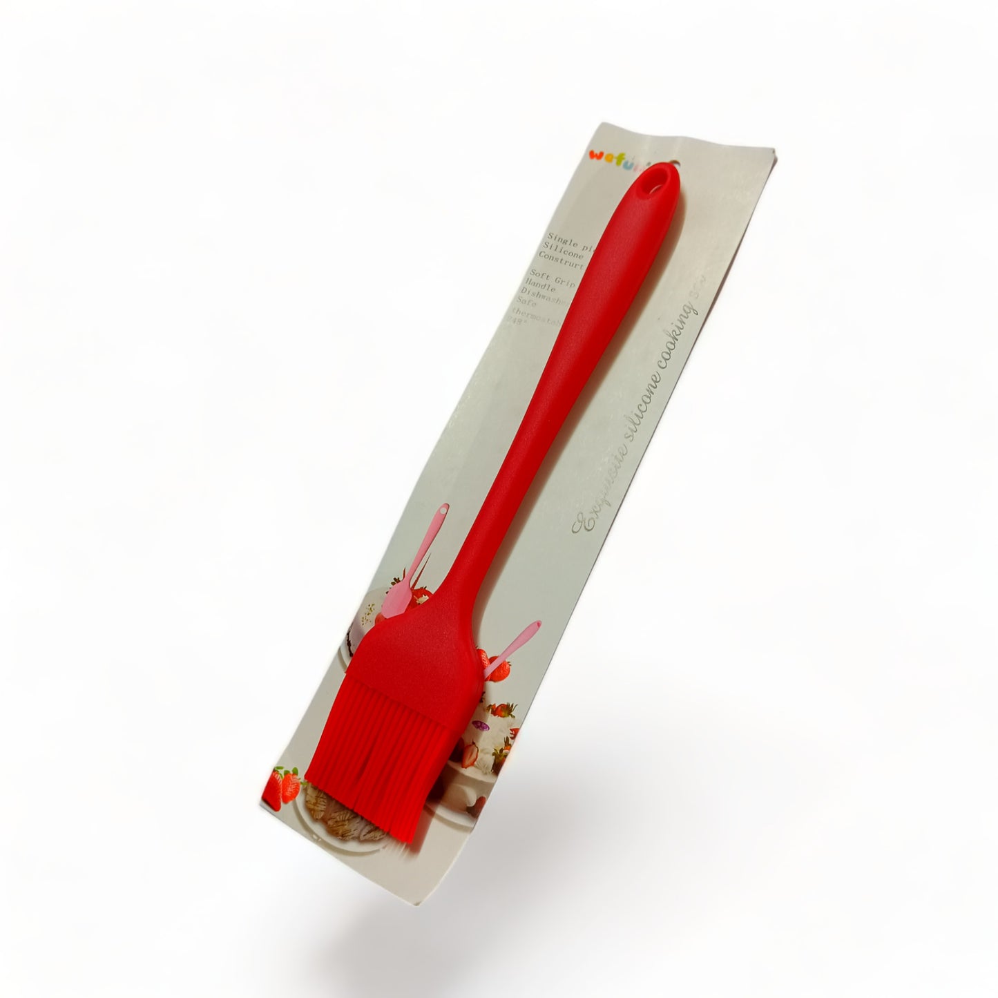 a red kite is flying in the sky