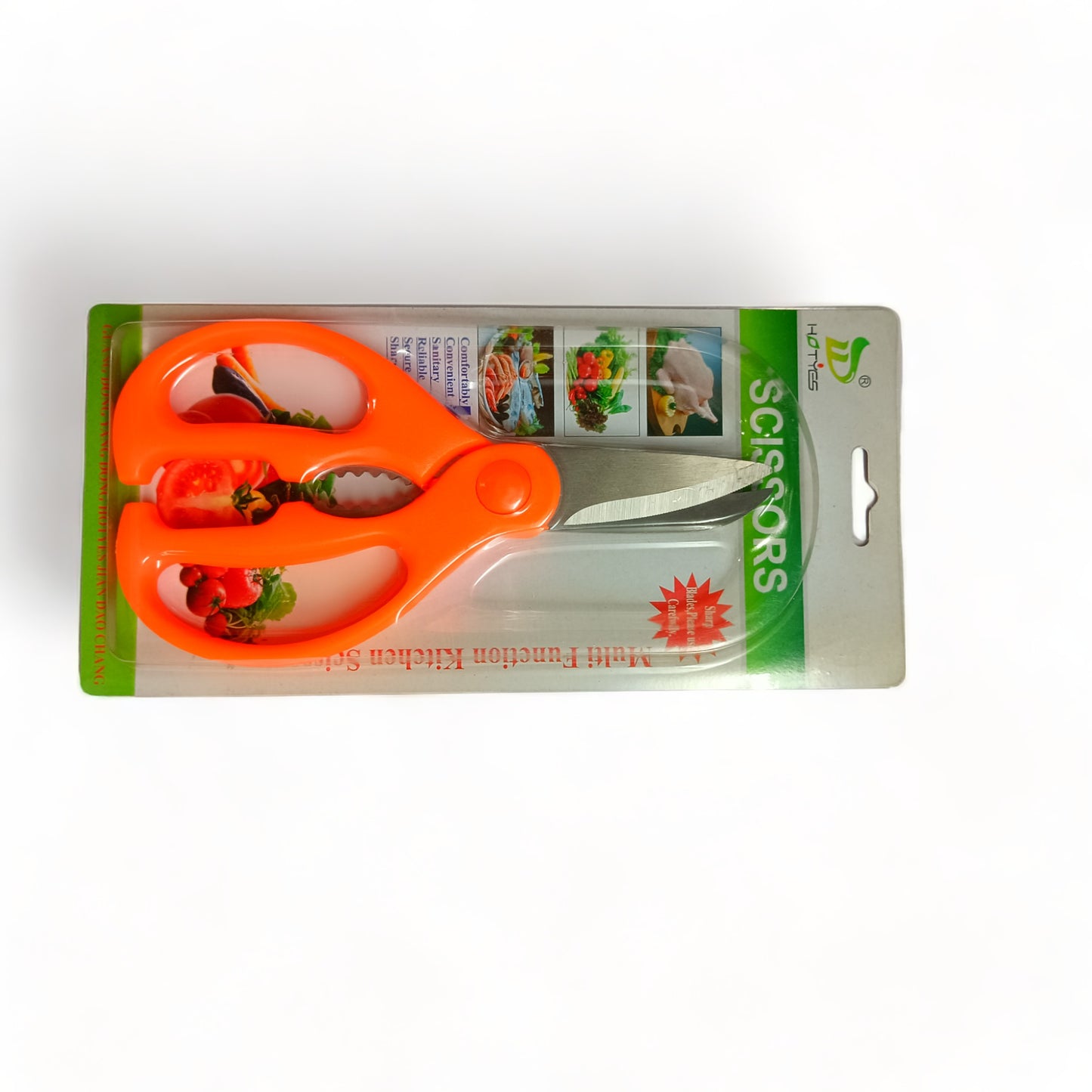 a pair of orange scissors on a white surface