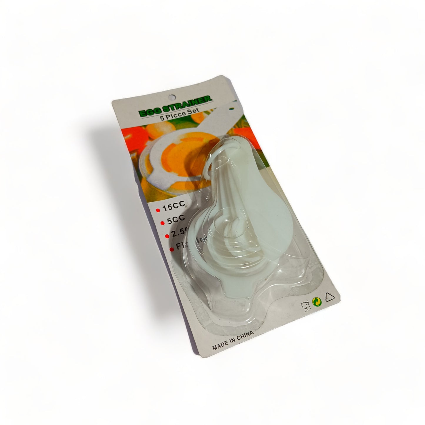 a can of soda sitting on top of a white refrigerator