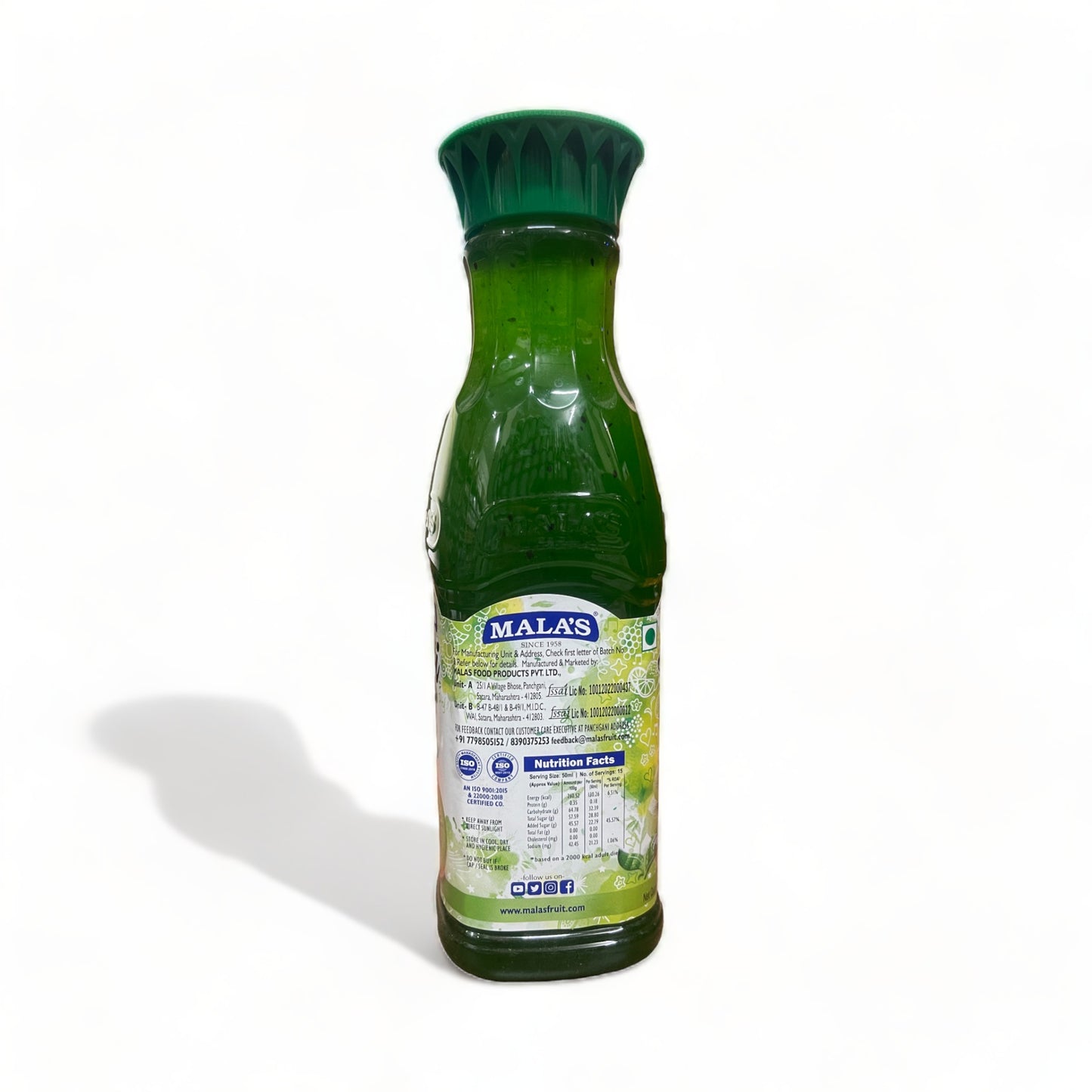 a bottle of alcohol sitting next to a green bottle