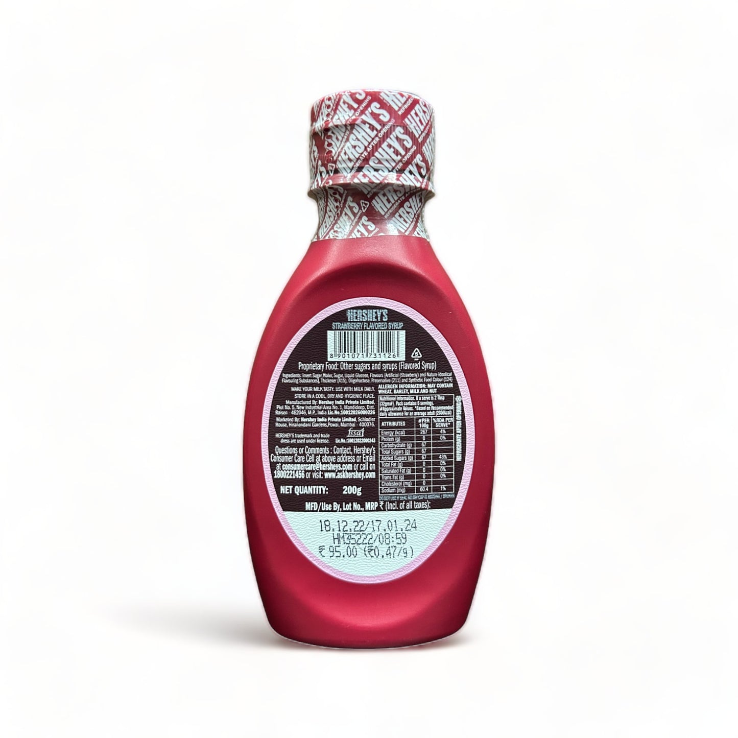 a close up of a clock on a red background