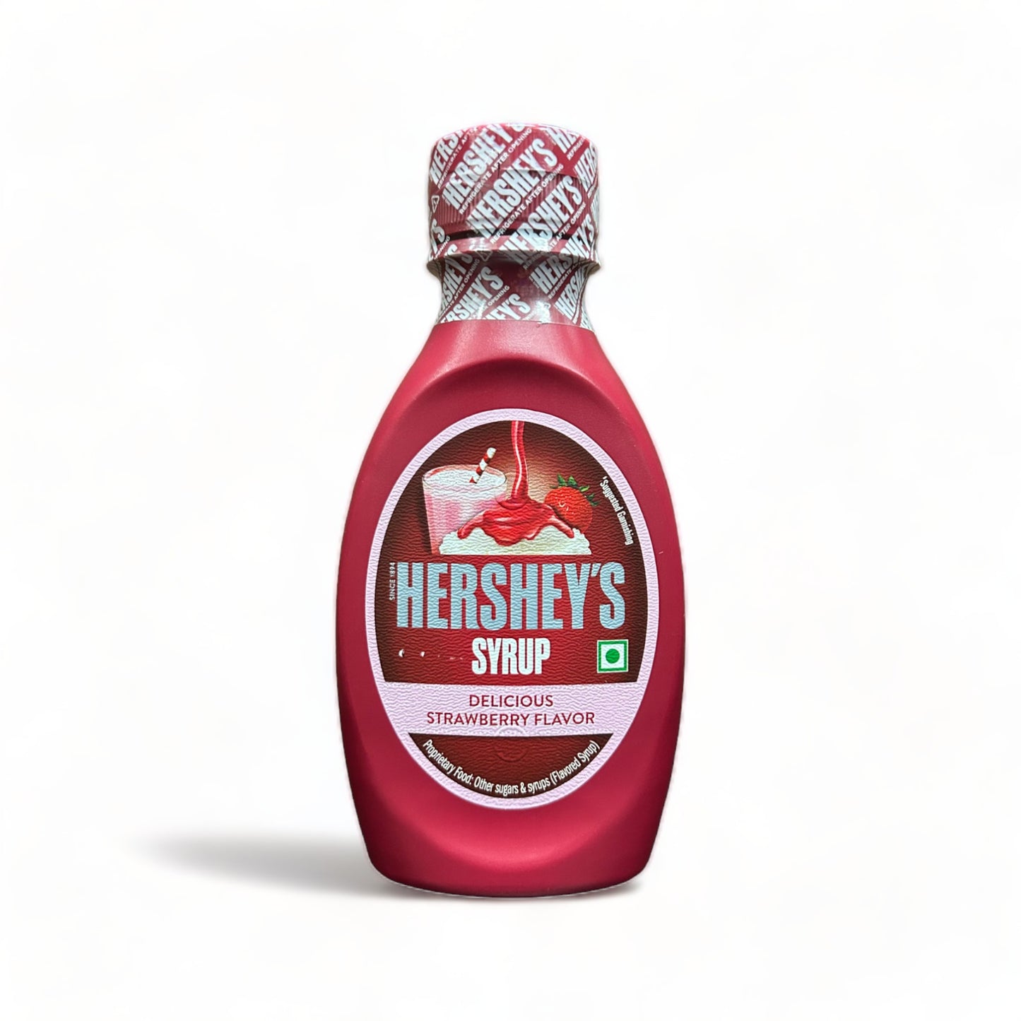 a close up of a red and white clock