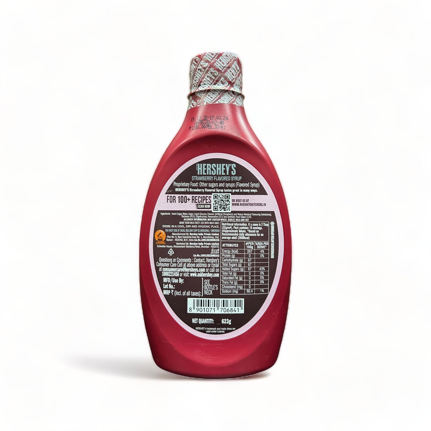 a close up of a red and white clock