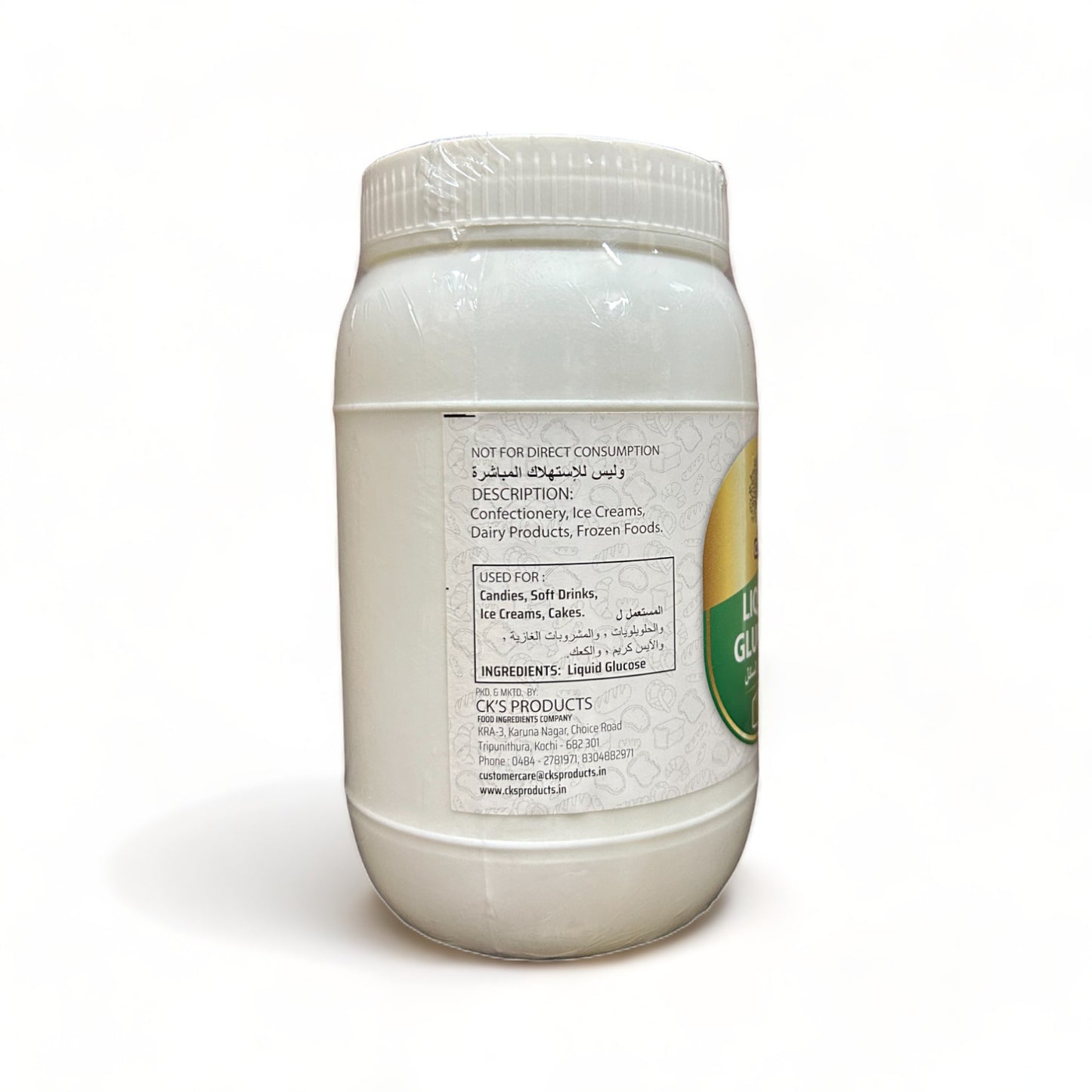 a bottle of water sitting next to a bottle