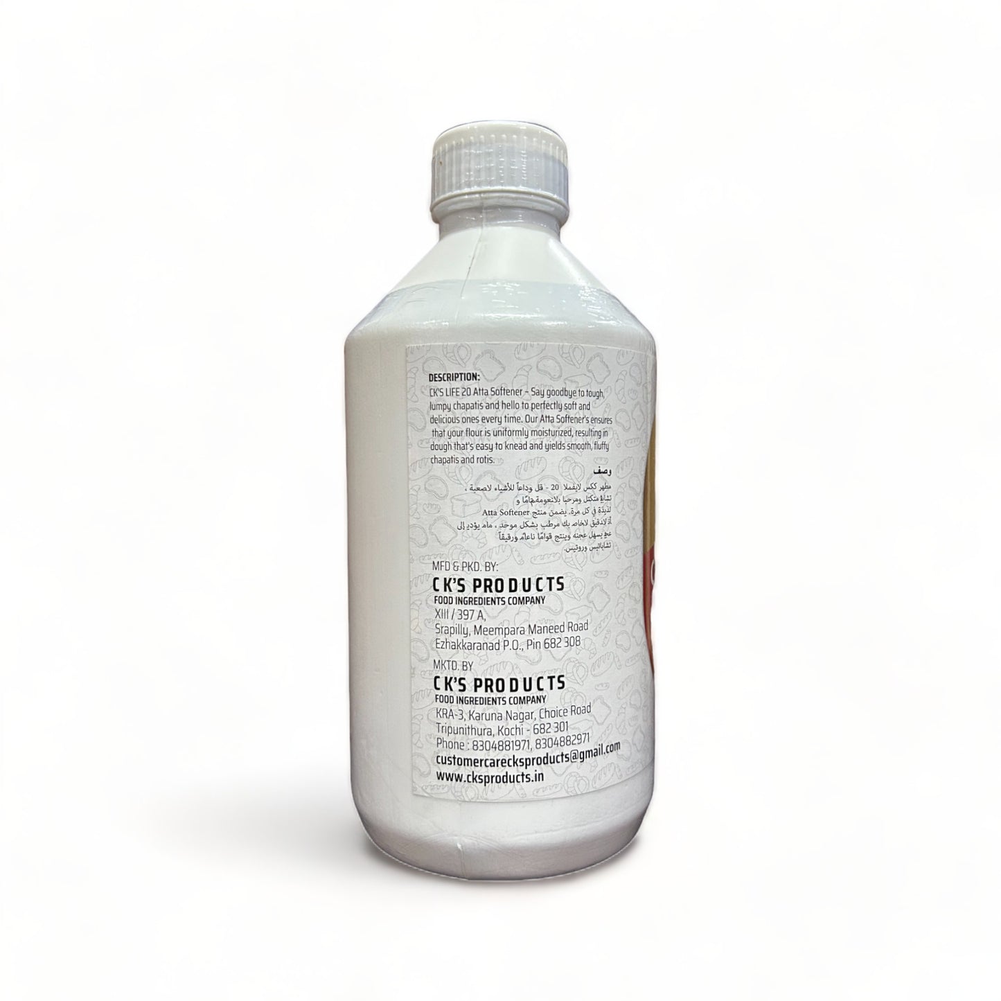 a bottle of water sitting next to a bottle