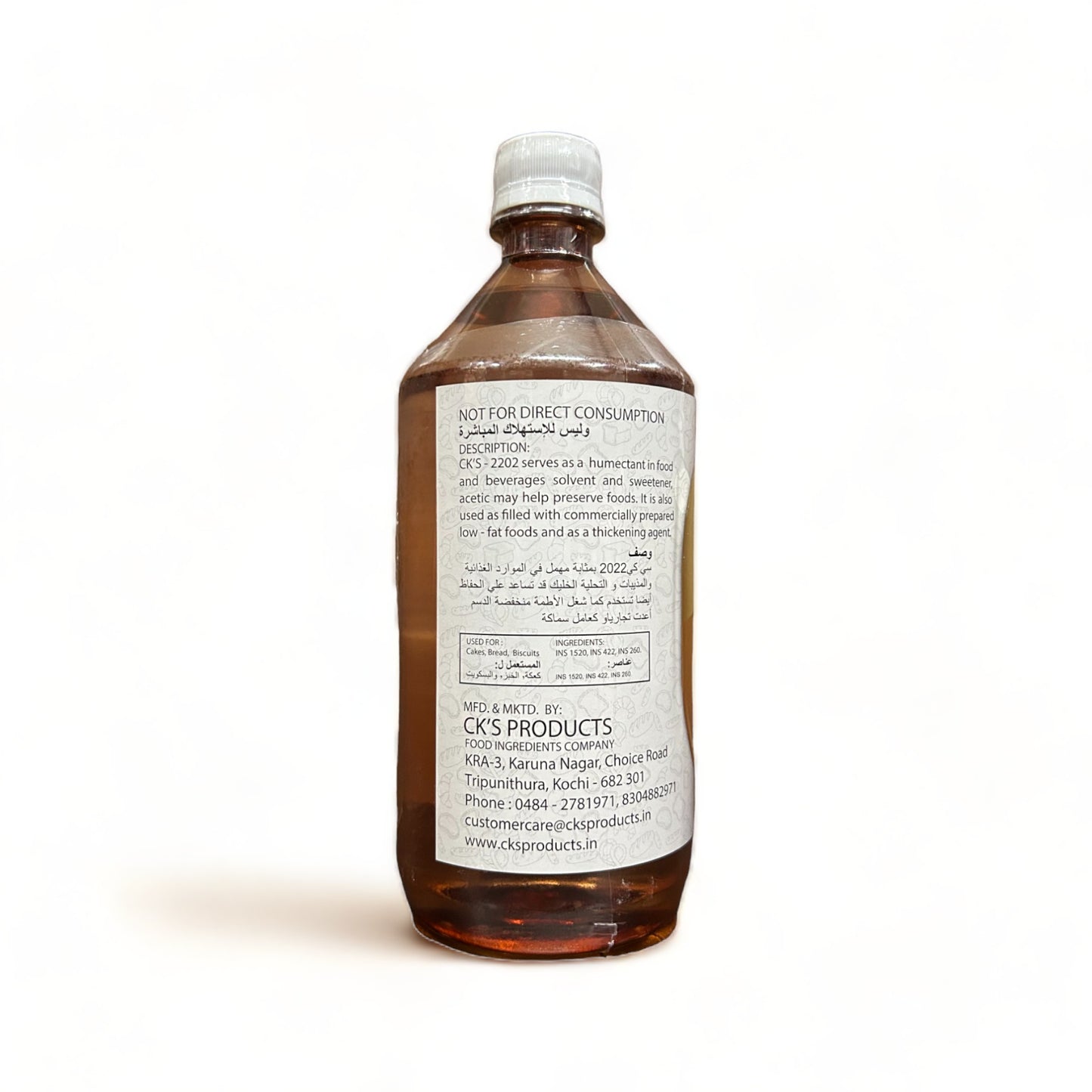 a bottle of water sitting next to a bottle