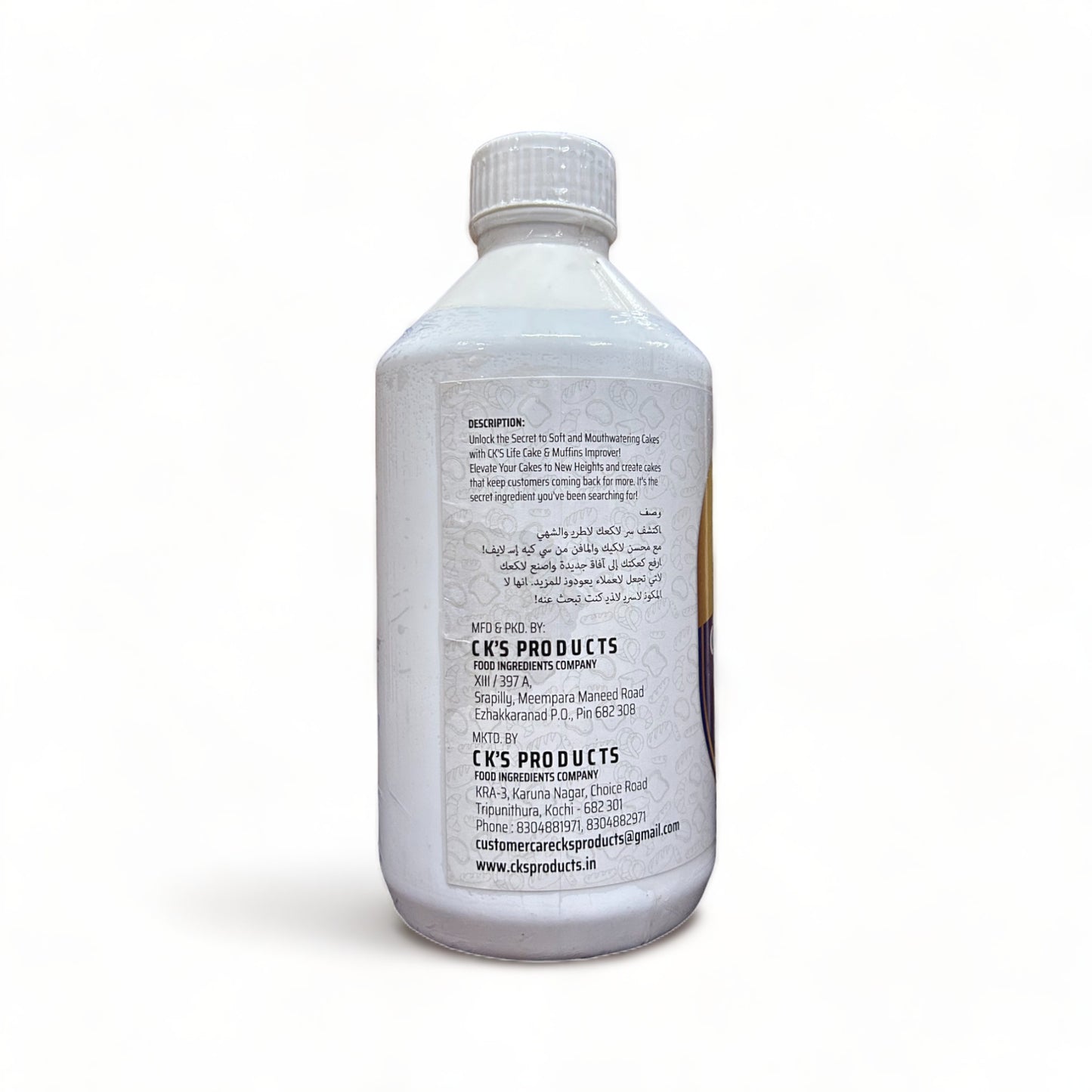 a bottle of water sitting next to a bottle