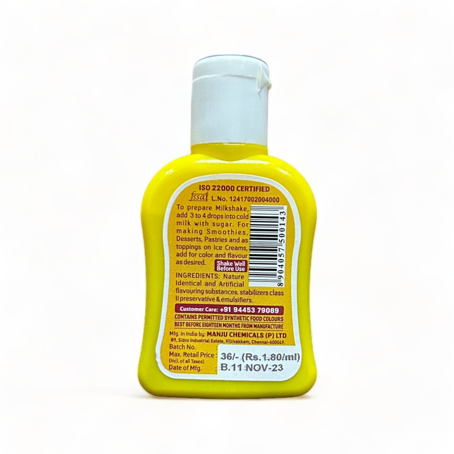 a yellow cell phone sitting on a table