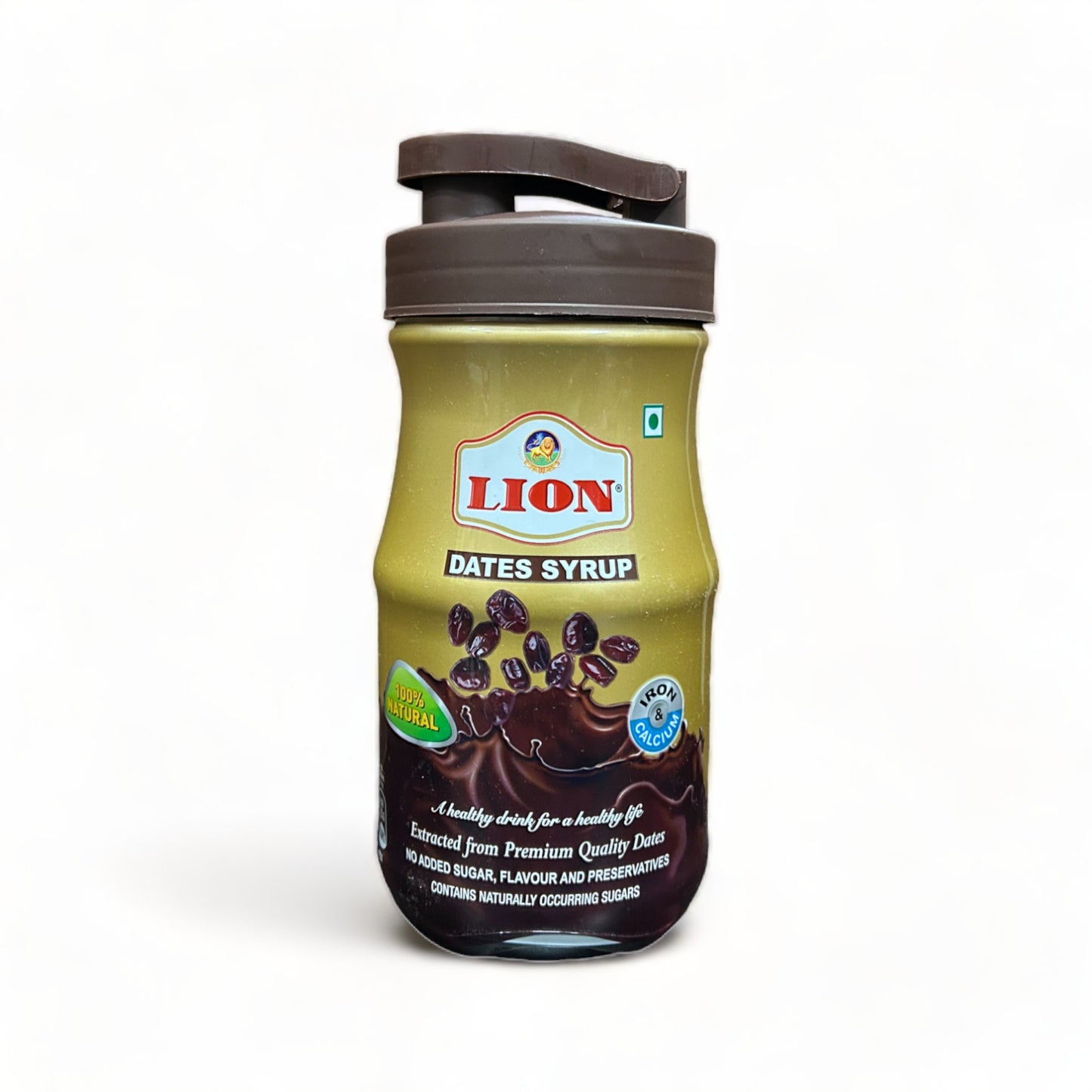 a bottle of alcohol sitting on top of a white shelf